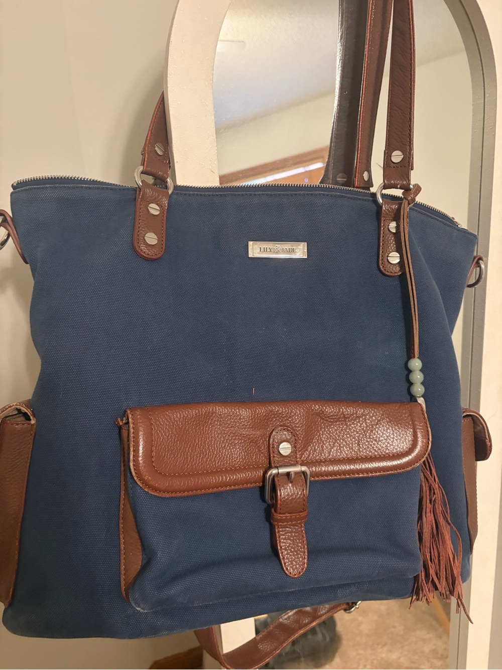 Lily Jade Navy Canvas Tote Diaper Bag with Brown Leather Accents and Tassel